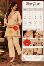 Ivory ethnic co-ord set with colourful floral embroidery and tassel detailing