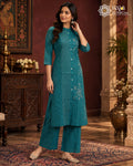 Teal green embroidered kurta pant set for women with floral detailing