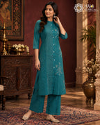Teal green embroidered kurta pant set for women with floral detailing