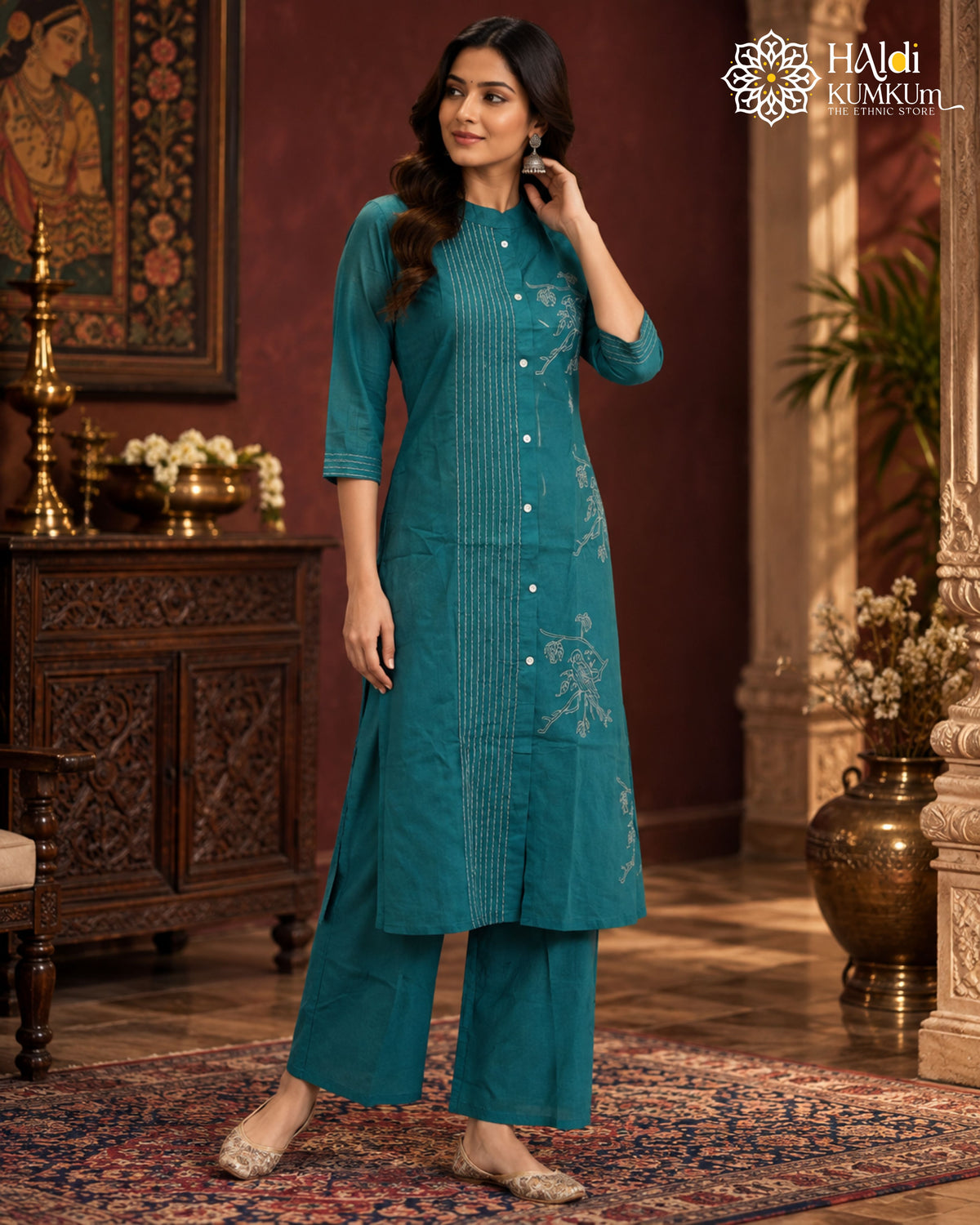 Teal green embroidered kurta pant set for women with floral detailing