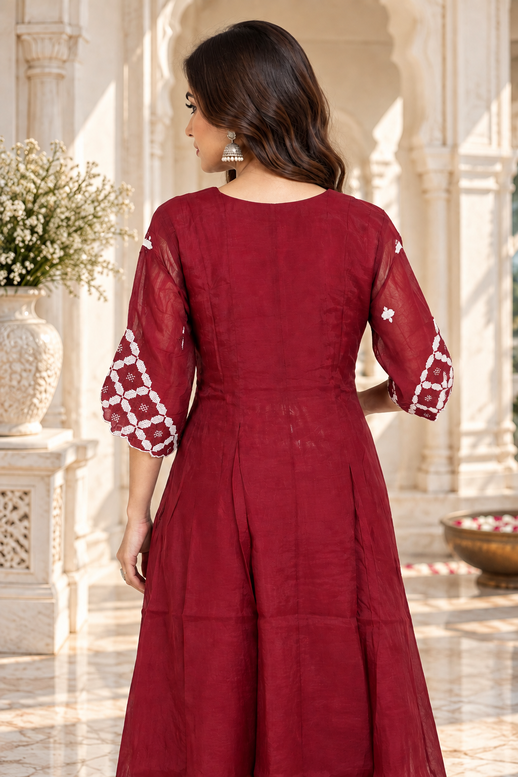 Maroon kurta with cream geometric embroidery and detailed sleeve cuffs