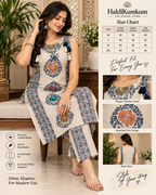 Beige peacock print kurta pant set with decorative tassel detailing