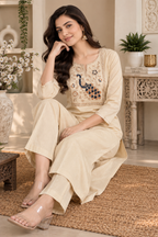 Cream straight kurta with multicolour peacock embroidery and front slit neckline