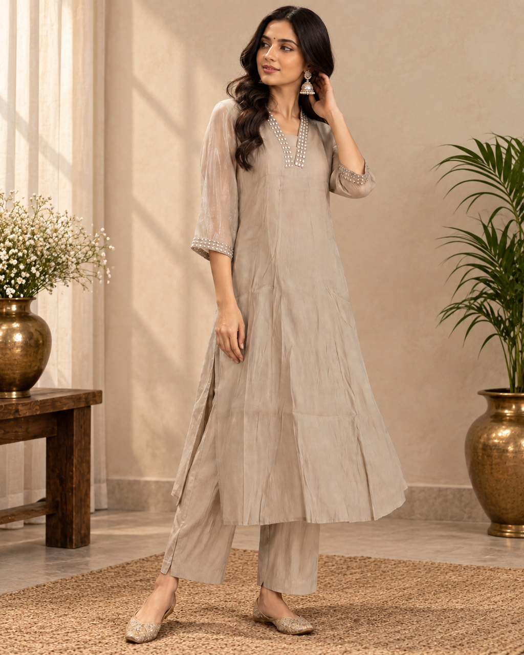 Beige embellished kurta pant set with detailed neckline and 3/4 sleeves