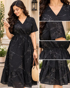 Black midi dress with light grey floral embroidery and short sleeves