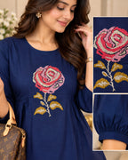 Navy blue A-line kurti with floral embroidery and gathered waist