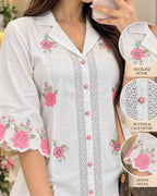 White kurti with pink and green floral embroidery, shirt collar and lace front panel