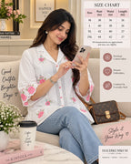 White embroidered kurti with scalloped 3/4 sleeves and floral lace detailing