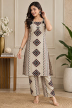 Beige printed kurta pant set with geometric diamond motifs and tassels