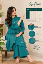 Teal green kurta with matching wide-leg pants and button-down front
