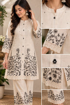 Ivory floral printed kurta with matching straight-fit pants and lace borders