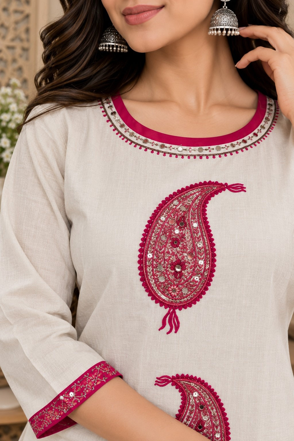 Ivory kurta with magenta pink paisley print and decorative border