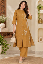 Mustard yellow printed kurta pant set with traditional white motifs