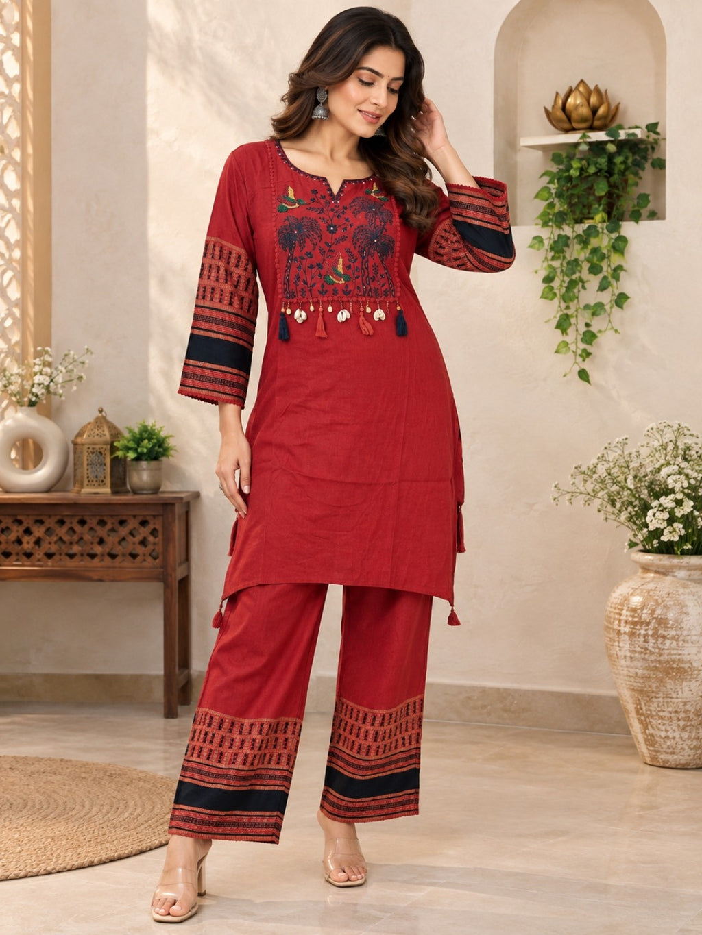 Maroon printed kurta pant set with embroidered front yoke