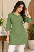 Olive green straight kurti with contrasting white pants for women